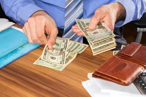 Counting dollars banknotes Foto stock