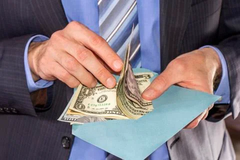 Counting dollars bribe Stock Photos