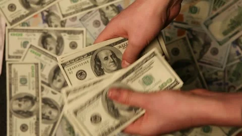 Counting dollars Stock Footage 258860165