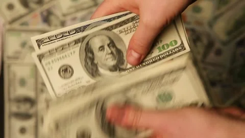 Counting dollars Stock Footage 258860173