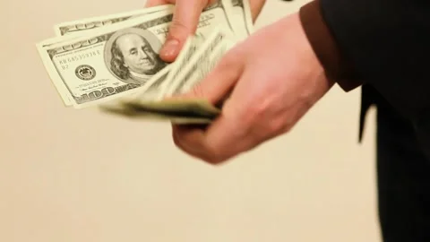 Counting dollars Stock Footage 258893015