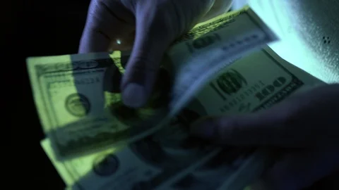 Counting dollars in hands, on white background Stock-Footage 85652498