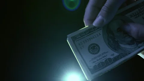 Counting dollars in hands, on white background Stock Footage 85660498