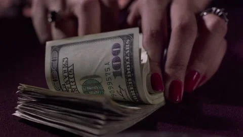 Counting dollars slow motion Stock Footage 131851086