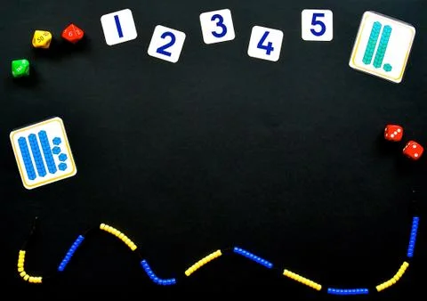 Counting flatlay on black background. Stock Photos