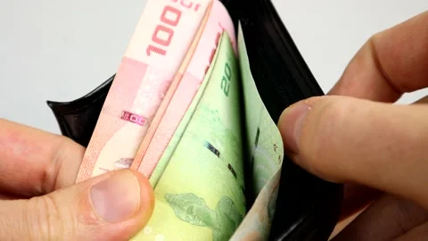 Counting How Much Thai Baht Is In A Wallet Video stock 132519927