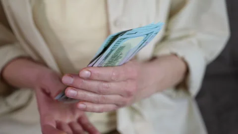 Counting hundred dollar bills Stock Footage 344172884