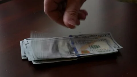 Counting Hundreds ($100 USA) Stock Footage 61540772