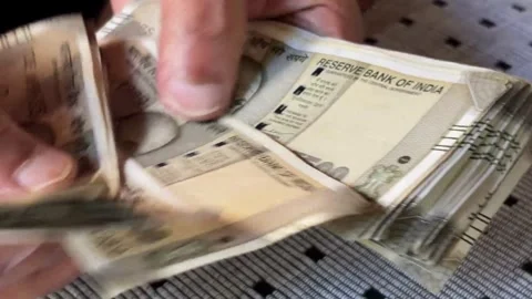 Counting indian rupee notes Stock Footage 320035686
