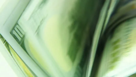 The counting machine counts many bills for one hundred American dollars of a new Stock-Footage 102621149