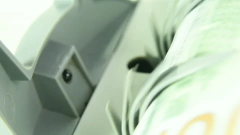 The counting machine counts many bills for one hundred American dollars of a new Stock-Footage 102621159