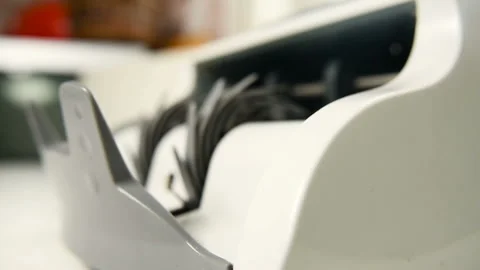 The counting machine counts many bills for one hundred American dollars of a new Stock-Footage 103479884