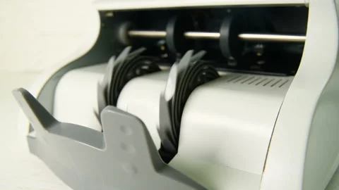 The counting machine counts many bills for one hundred American dollars of a new Stock-Footage 108618628