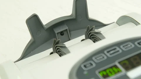 The counting machine counts many bills for one hundred American dollars of a new Stock-Footage 108618688