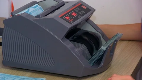 А counting machine for money Stock Footage 103502183