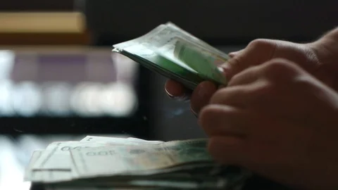 Counting Money and Piling Up Stack of Money Stock Footage 92971549