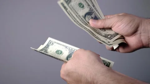 Counting money one by one Stock Footage 289029862