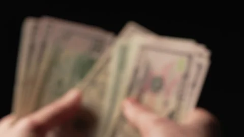 Counting money process on a blurred background Stock Footage 264979255