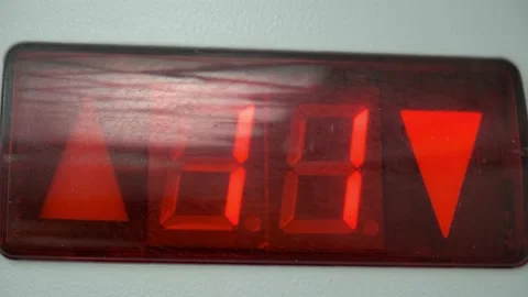 Counting the number of floors on the display of the freight Elevator. Countdown Stock Footage 141710261