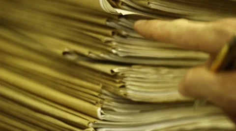 Counting old documents Stock Footage 51969758