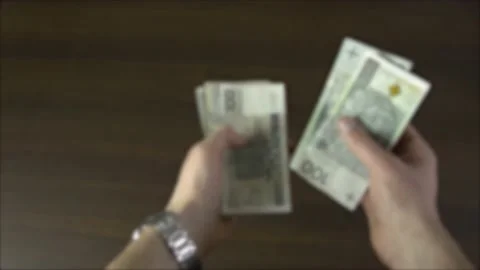 Counting polish bills two hands Stock Footage 143974326