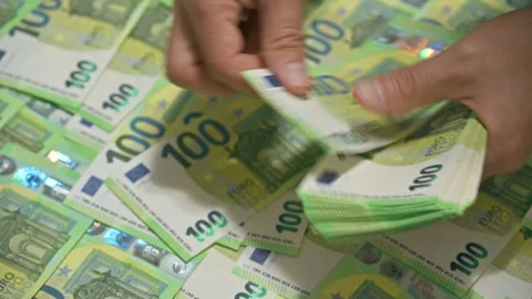 Counting a stack of 100 euro banknotes Stock Footage 339432528