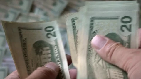 Counting Stack Of Cash Against Money Background Then Revealing Cash Stockbeeldmateriaal 247418903