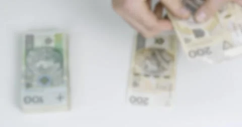 Counting stack of polish bills Stock Footage 143974060