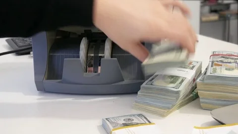 Counting US Dollars Banknotes On Currency Counter Machine Stock-Footage 84571961