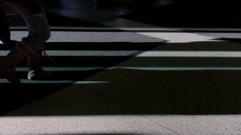 Countless feet passing through a doorway Stock Footage 336253614