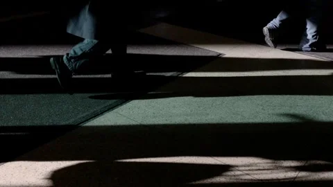 Countless feet passing through a doorway Stock Footage 336254223