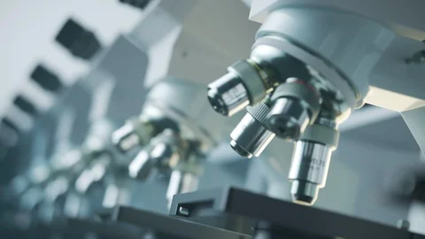 "Countless modern microscopes in a row analysing samples in an endless loop. Video stock 98951555