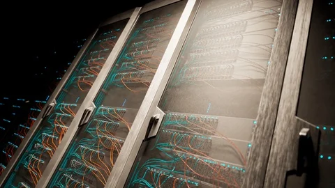 Countless vintage server cabinets in a render farm. Dark room spotlight. 4KHD Stock Footage 126258949