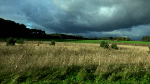 Country fields and dramatic sky Stock Footage 169049263