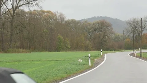 Country road with car Stock Footage