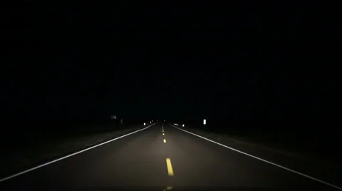Country Road Driving at Night in Middle Lane Stock Footage