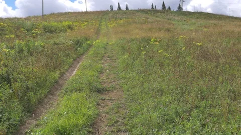Country road on the hill Stock Footage 81014580