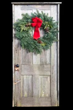 Country style rustic front door with Christmas wreath Stock Photos