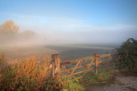 Countryside background with gate Stock Photos