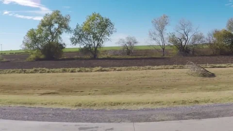 Countryside in the fall. Wheat fields. Scenic view from car. Stock Footage 82071609