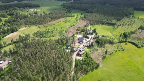 Countryside Farm And Fields And Tractor From Above Rotating Slow During Summer Stock Footage 232932686