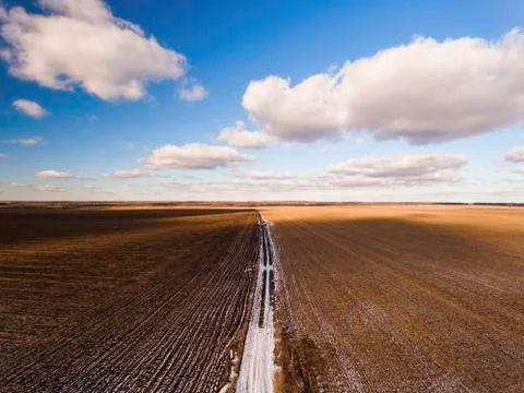 Countryside with fields in winter time. Stock Photos