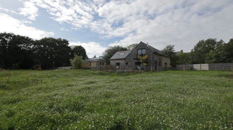 COUNTRYSIDE HOUSE WITH GRASS Stock Footage 28015149