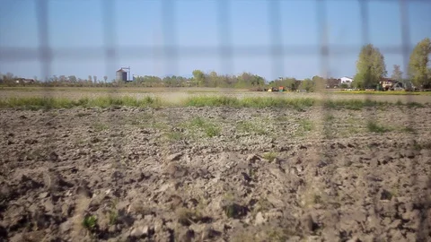 Countryside landscape behind the net Stock Footage 128688829