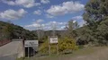 Countryside location Santa Luzia River Wild Water Beach with bridge and sign 4k or 4k+ Resolution