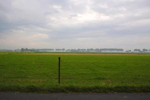 The countryside from a path on a cloudy day Stock Photos