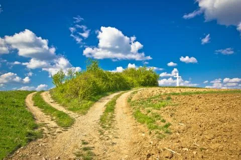 Countryside path intersection view in green nature Stock Photos