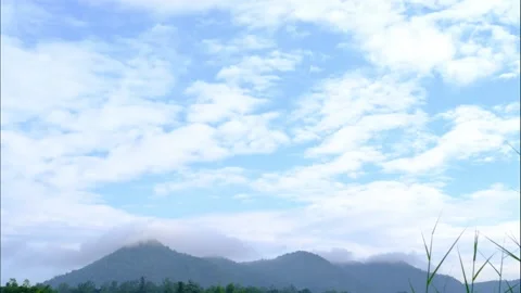 Countryside scenery with dramatic cloudy sky and mountains range, time lapse Video stock 145539997