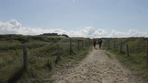COUNTRYSIDE TRACK WITH PEOPLE Stock Footage 28015245