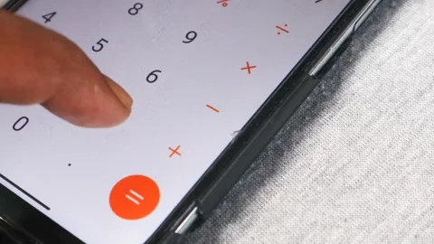 Counts on a calculator of smartphone Stock-Footage 332883666